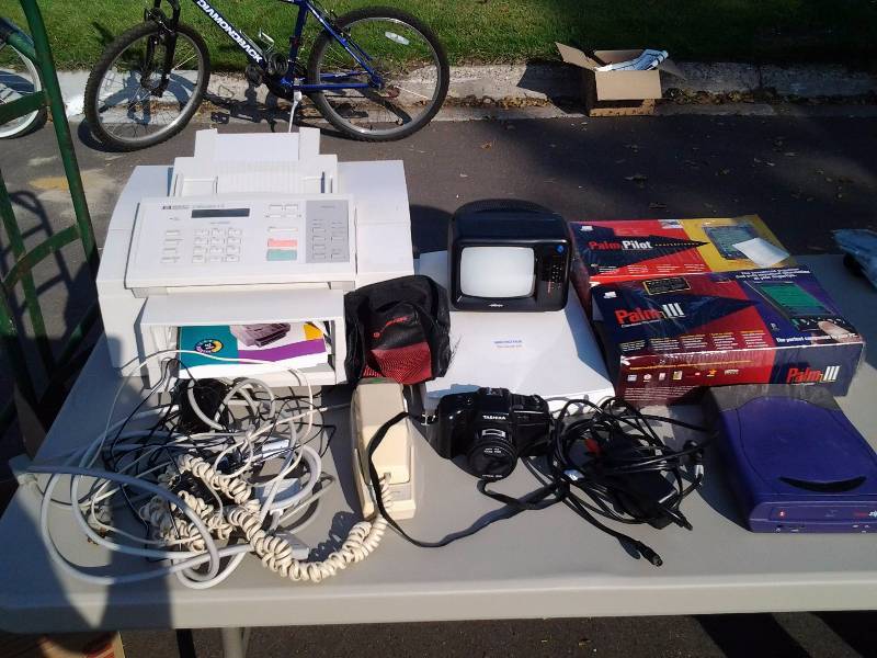 lot 61 image: HP ScanJet (Works), 2-Palm Pilots, TVRadio, Phone, Scanner, 35mm Camera