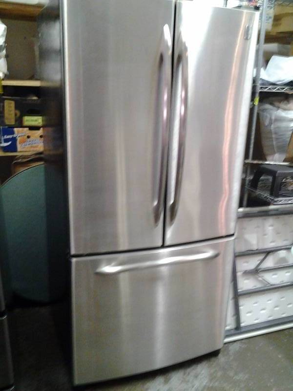 lot 2 image: GE Profile Stainless FrontBlack Sides French Door Refrigerator - Works