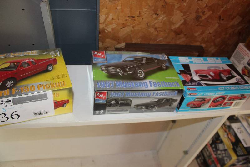 lot 36 image: Lot of (3) 125 Scale Plastic Model Kits Includes AMT 1997 Ford F-150 Pickup, 1967 Mustang Fastback, Monogram Shelby 427 Cobra Street