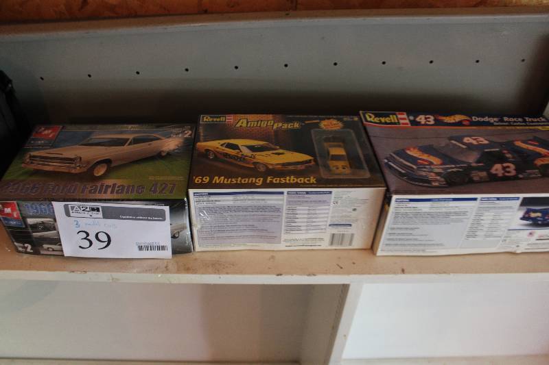 lot 39 image: Lot of (3) 125 Scale Plastic Model Kits Includes AMT 1966 Ford Fairlane, Revell 1969 Mustang Fastback, Revell #43 Richard Petty Dodge Race Truck