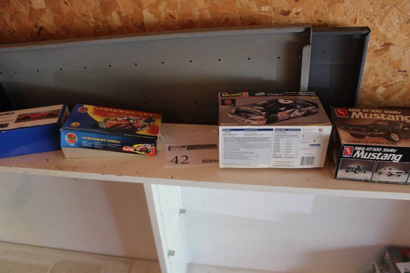 lot 42 image: Lot of (4) 125 Scale Plastic Model Kits Includes AMT 1968 GT500 Shelby Mustang, Revell Mart Martin #6 Viagra Taurus, AirFix Yamaha 500cc, Mini Exotics 1964 GTO Series II