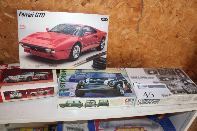 lot 45 image: Lot of (4) 124 Scale Plastic Model Kits Includes Ferrari GTO, Porsche 934, Morris Mini, High Tech Cobra Daytona Coupe