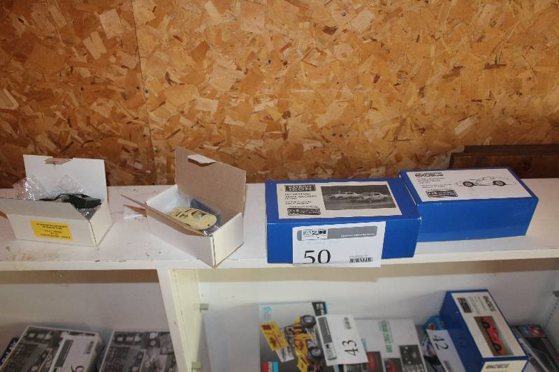 lot 50 image: Lot of (4) 125 Scale Plastic Model Kits Includes Detroit Iron 1967 Mustang Trans-Am Coupe, Mini Exotics Cobra Daytona Super Coupe 124 Resin Conversion Kit For Monogram 427 Cobra, Mustang, Ferrari