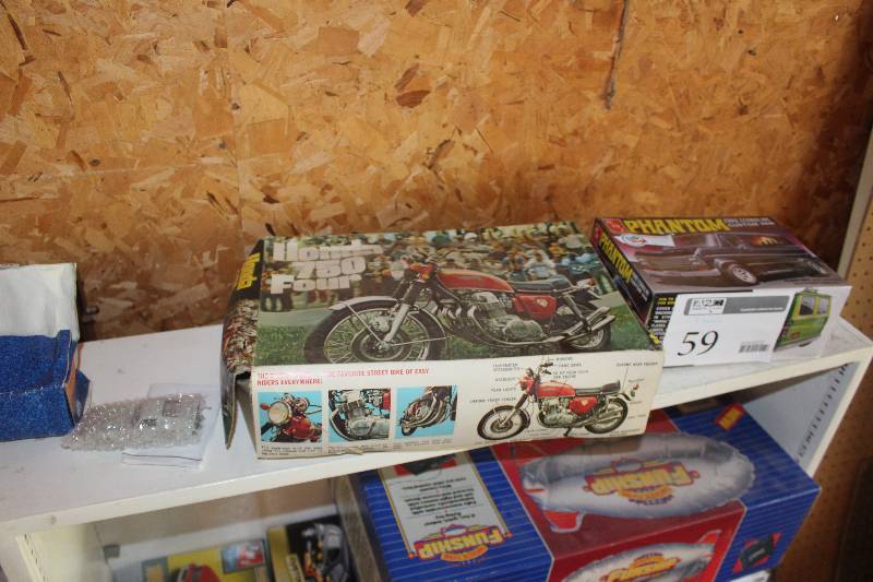 lot 59 image: Lot of (3) Scale Model Kits Includes AMT Phantom, Honda 750 Four, 1964 Sebring 12H Ferrari 250 GTO