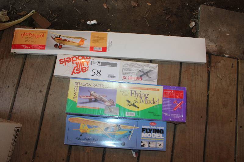 lot 58 image: Lot of (4) Model Airplane Kits Includes Guillows Piper Super Cub 95 Balsa Kit, Gilmore Red Lion Racer, Dumas Aircraft Pietenpol, Bleriot XI