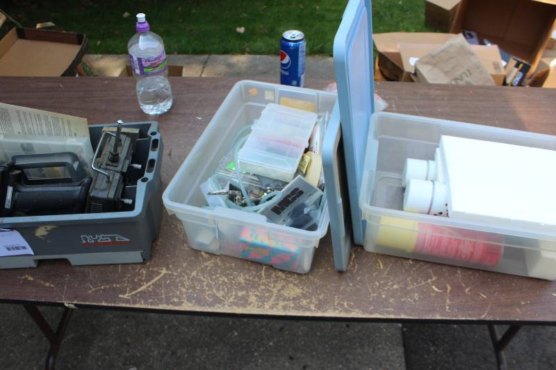 lot 75 image: Misc Radio Controller Equipment, Supplies Includes Cleaner, Foam, Controllers, Parts