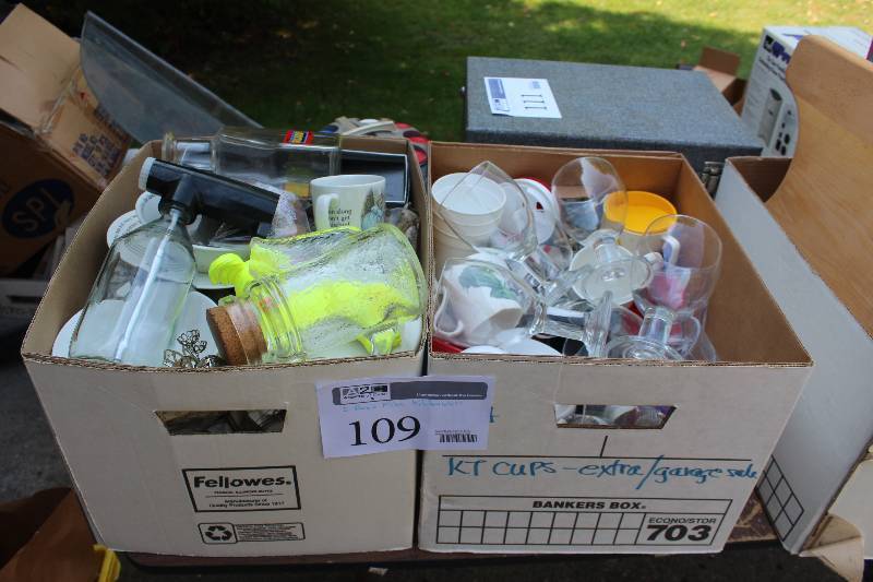 lot 109 image: Lot of (2) Boxes of Kitchenware Includes Mugs, Stemware, Plastic Cups, And More