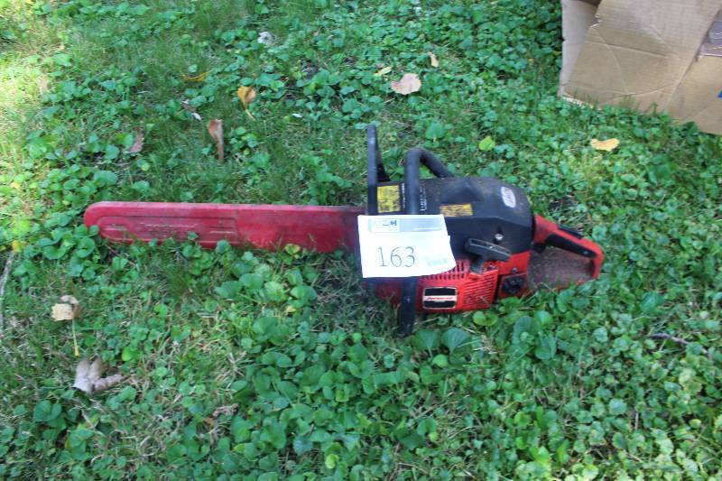lot 163 image: Jonsered Chainsaw w Blade Cover