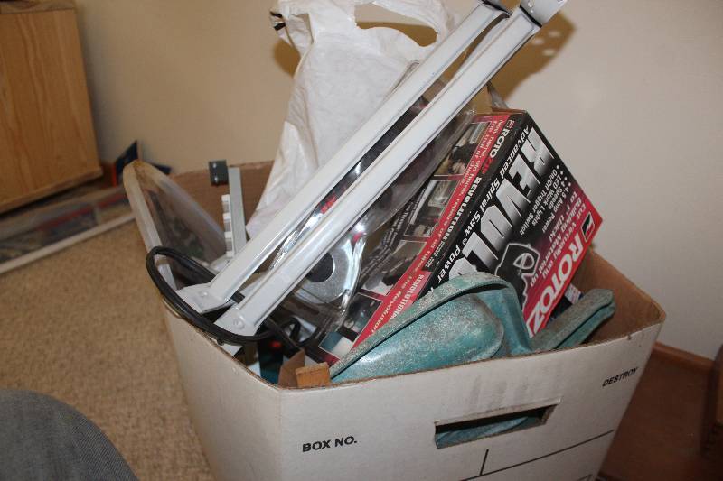 lot 201 image: Black & Decker Wizard Multi-Tool, Rotozip Multi-Tool, Shelf Brackets, Drawer Dividers, And More
