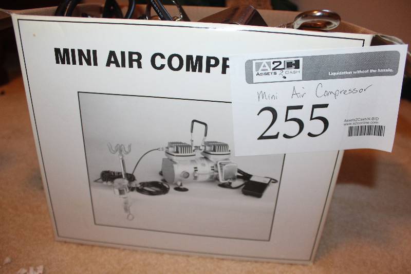 lot 255 image: Mini Air Compressor
