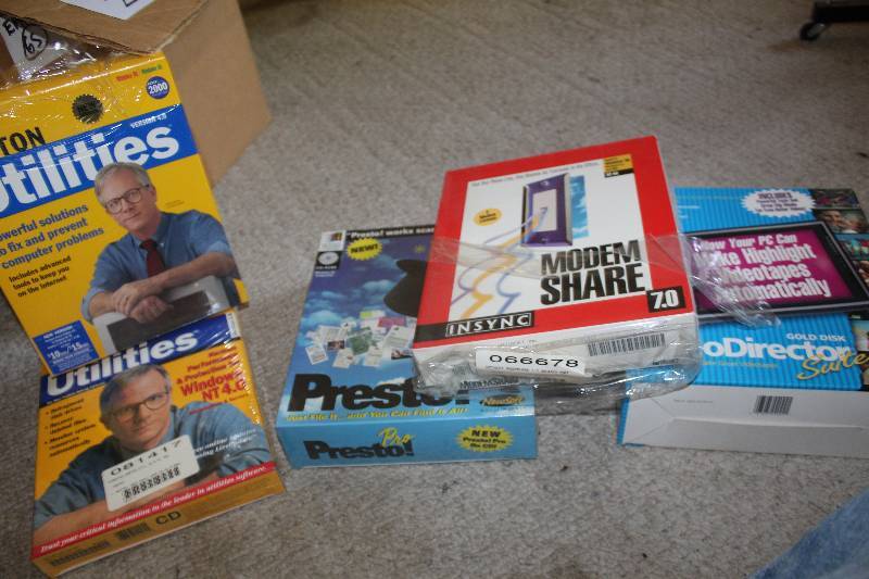 lot 226 image: Computer Software Includes Modem Share, Presto Pro, Video Director, Norton Utilities, Windows NT Resource Kit