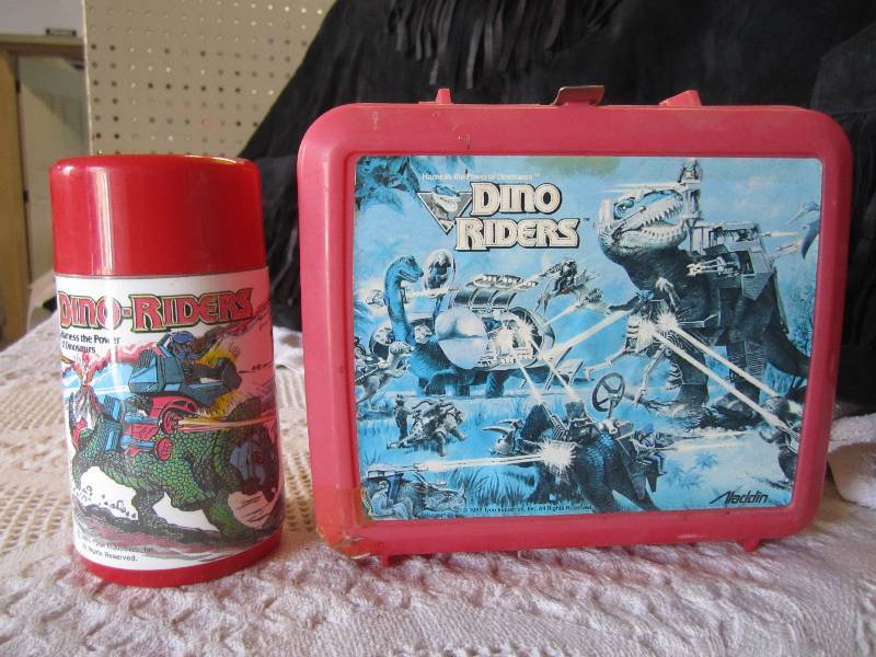 lot 78 image: Dino Riders Lunch Box with Thermos ...