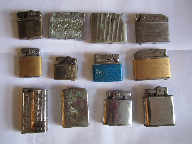 lot 123 image: Lot of 12 Vintage Lighters...