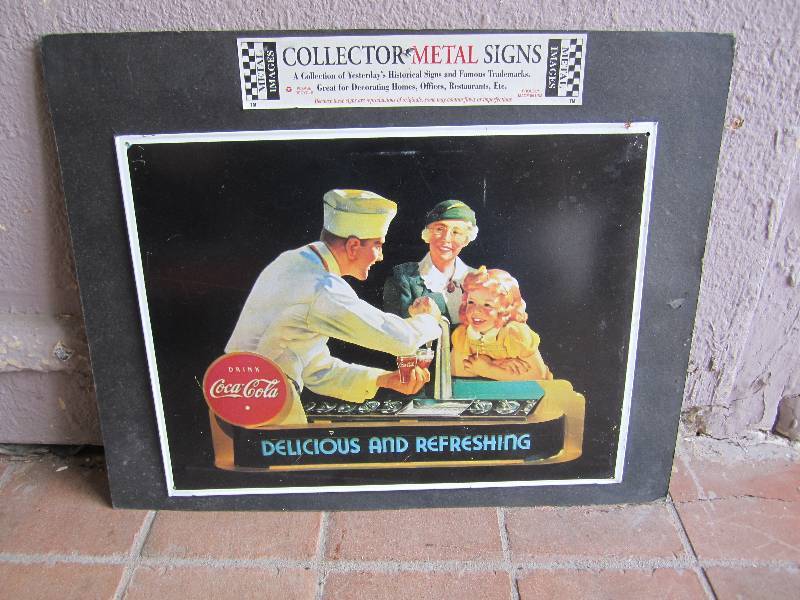 lot 214 image: Coca-Cola Tin Sign on card stock ba...