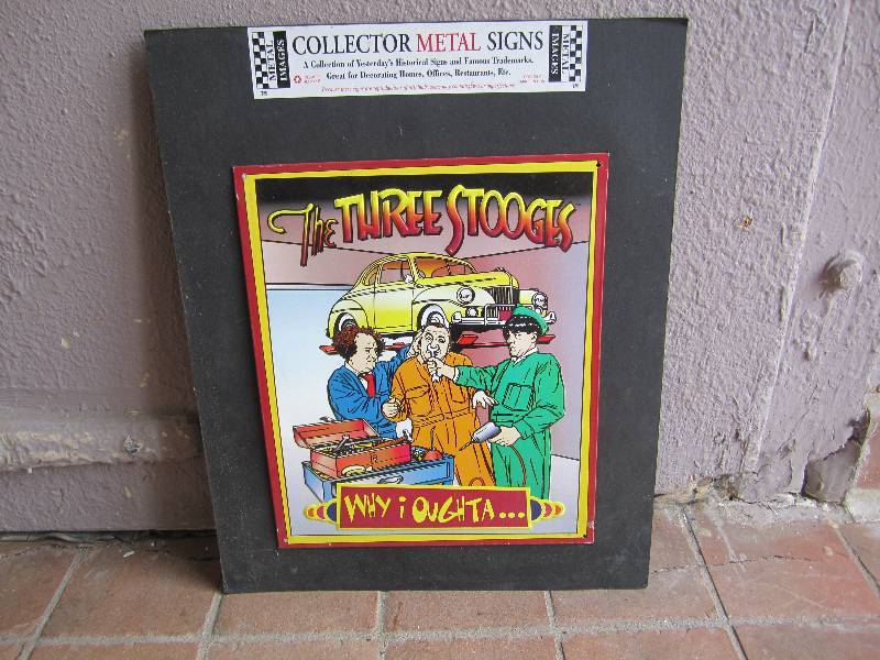 lot 215 image: The Three Stooges Tin Sign on card ...