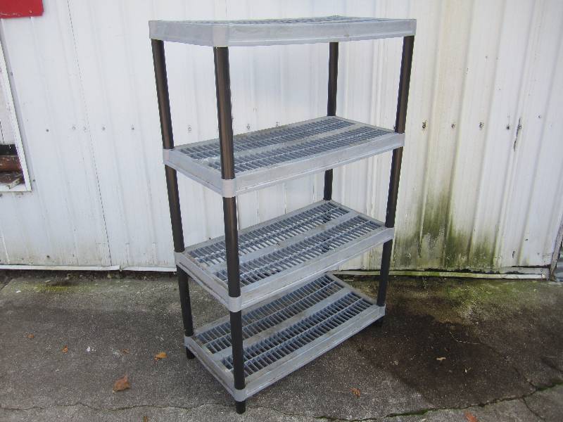 lot 280 image: Plastic Shelving Unit 18 x 36 x 5...