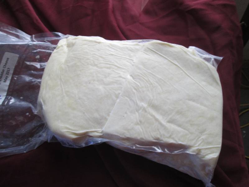 lot 26 image: 7.2 lb.Chunk Sharp Cheddar Cheese P...