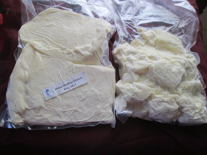 lot 27 image: 8.8  lb.Chunk Sharp Cheddar Cheese ...