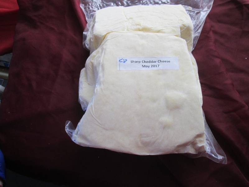 lot 29 image: 6.8 lb.Chunk Sharp Cheddar Cheese P...