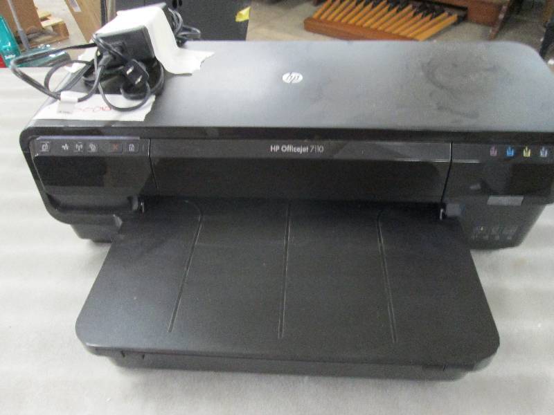 lot 128 image: HP OfficeJet 7110 used, powers on...