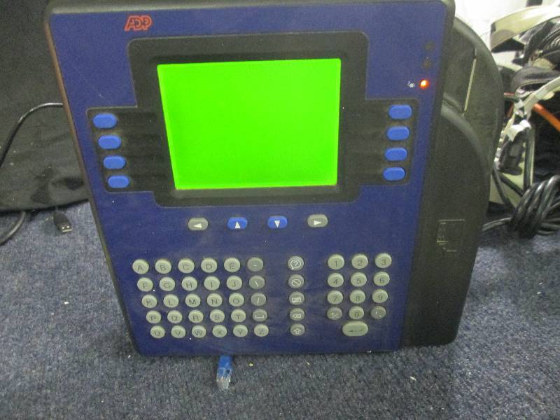lot 223 image: ADP Time Clock- powers up...