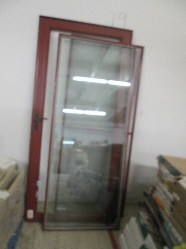 lot 343 image: Red Metal Storm Door with full glas...