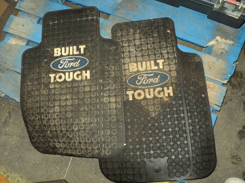 lot 8 image: 2 ford truck mats...