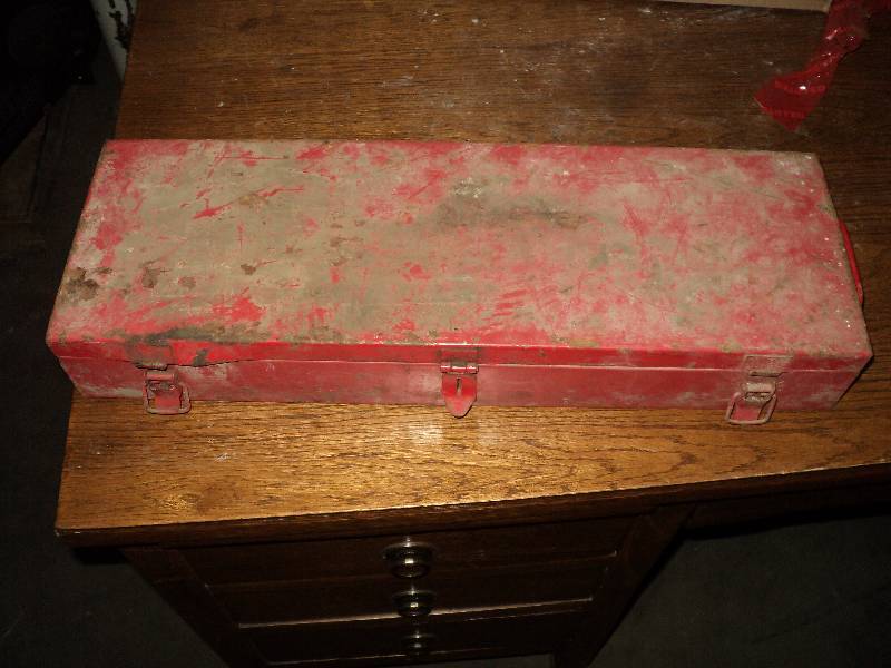 lot 23 image: red tool box with tools...