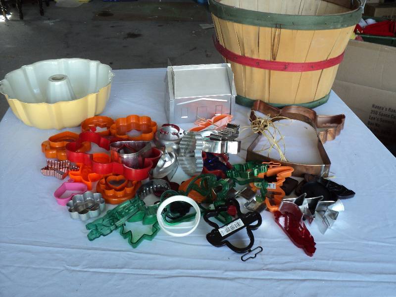lot 105 image: basket full of cookie cutters and b...