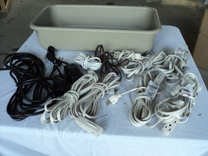 lot 118 image: tub of extension cords...