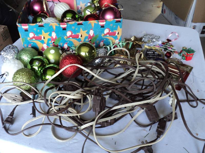 lot 124 image: christmas box with ornaments, cords...