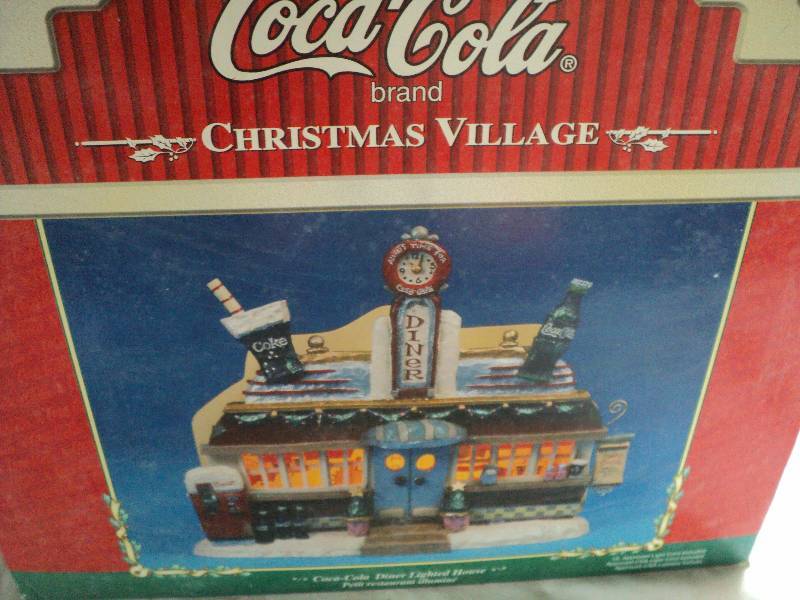 lot 202 image: coca-cola christmas village...