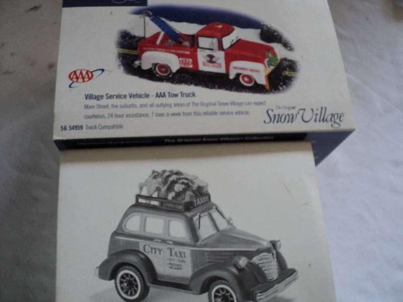 lot 207 image: frpy 56 AAA tow trucfk and city tax...