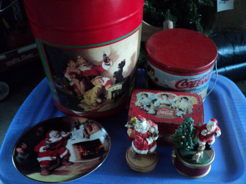 lot 225 image: coca-cola tins, plate, and figurine...