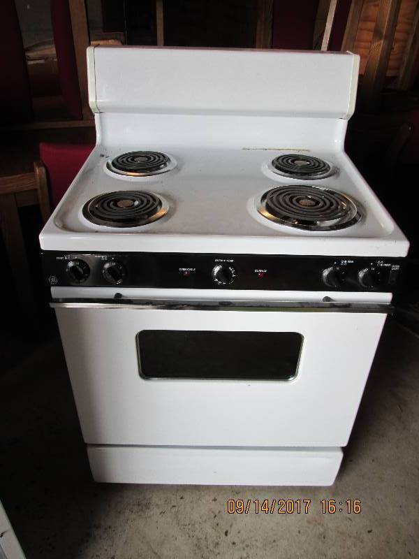 lot 24 image: GE electric range and oven...
