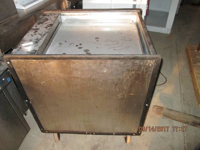 lot 35 image: Stainless steel serving cart on whe...