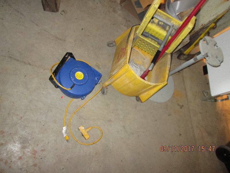 lot 39 image: Mop bucket, broom rack and 35 foot ...