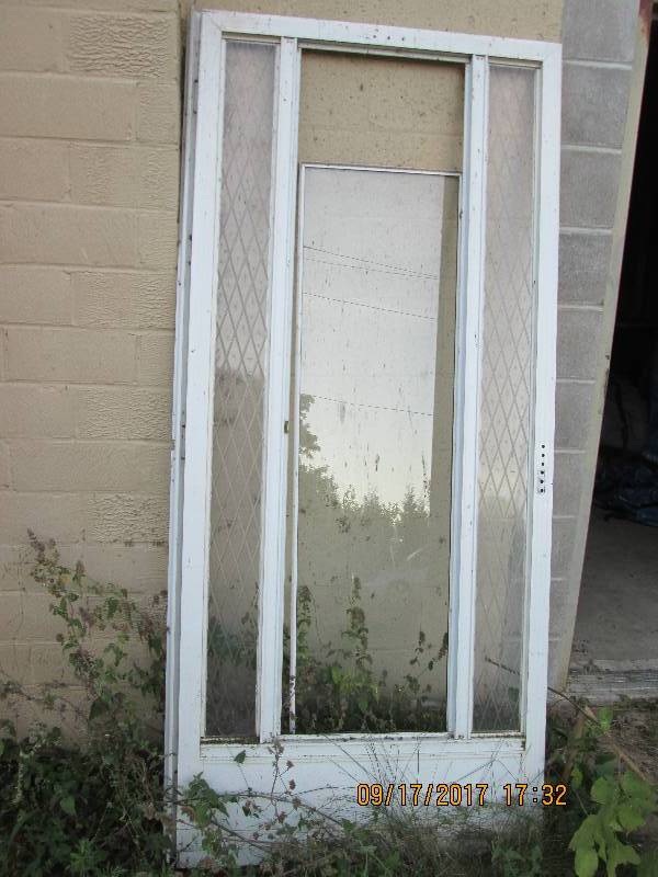 lot 82 image: Storm Door 35 14 wide...