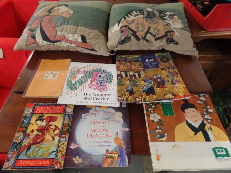 lot 608 image: ASIAN PILLOWS AND ILLUSTRATED BOOKS