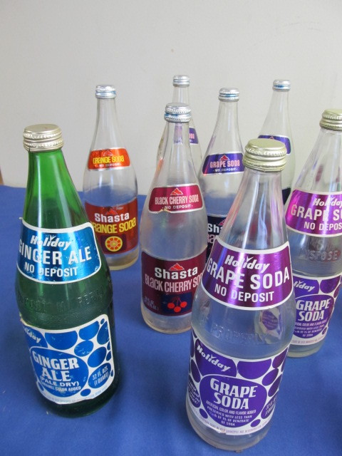 lot 122 image: Large Lot of Holiday 1 Liter Soda Bottles