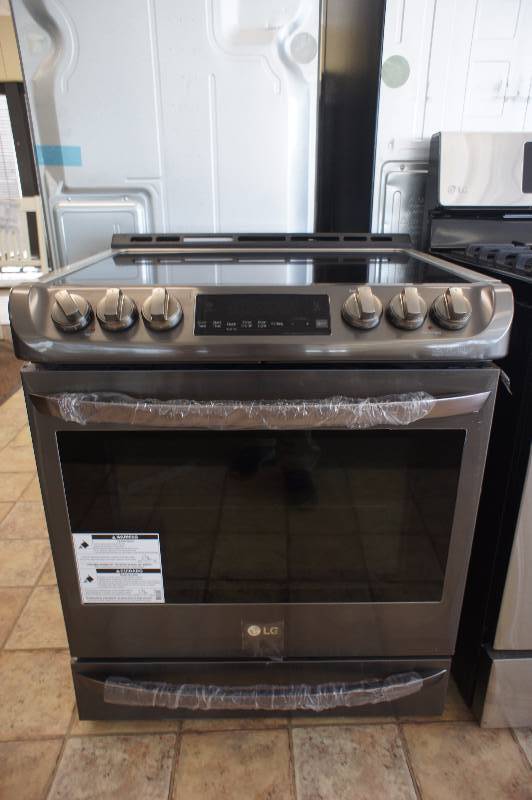 lot 12 image: New - Scratch & Dent LG Model # (LSE4613BD) - Slide-in Electric Convection Range - 6.3 cu ft - Black Stainless Steel -Tested Works - MSRP $ 1999.99