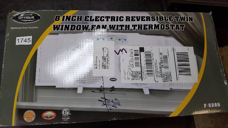 lot 1745 image: Optimus Electrically Reversible Twin Window Fan
