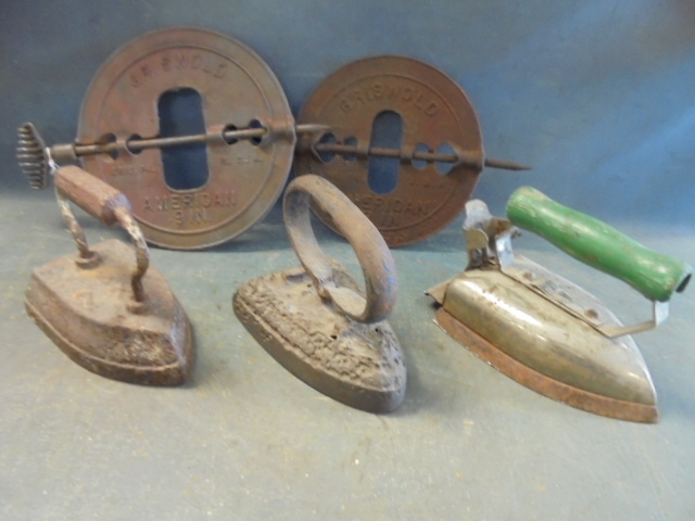 lot 169 image: Antique Irons and Stove Dampers