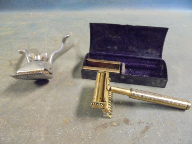 lot 73 image: Antique Razor and Clippers