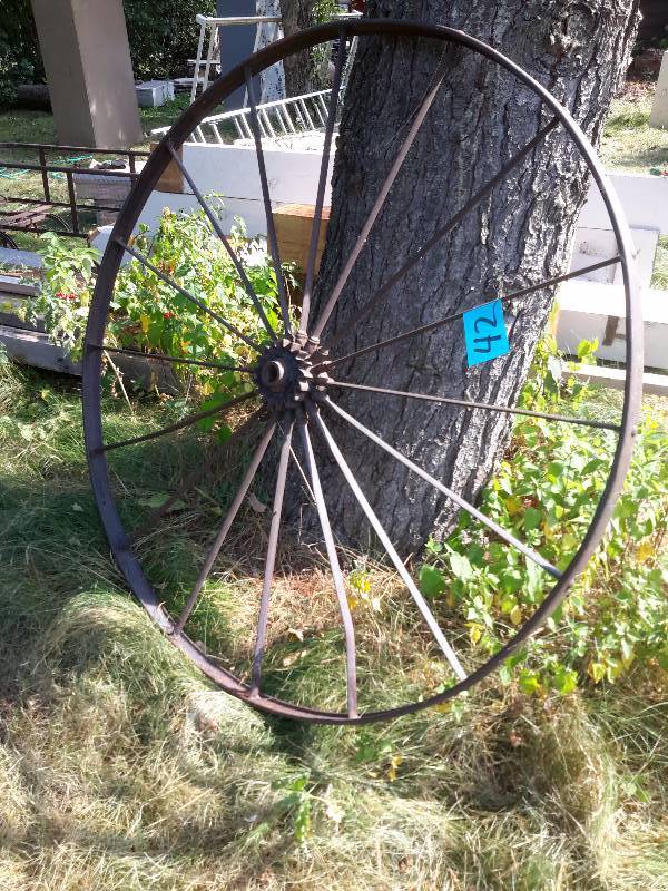lot 41 image: 2, Antique Steel Wagon Wheels, 44in diameter