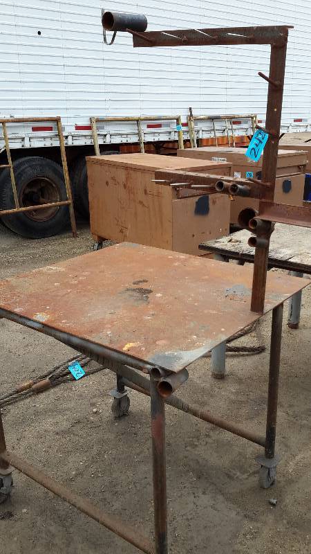 Steel table with upper hanging unit