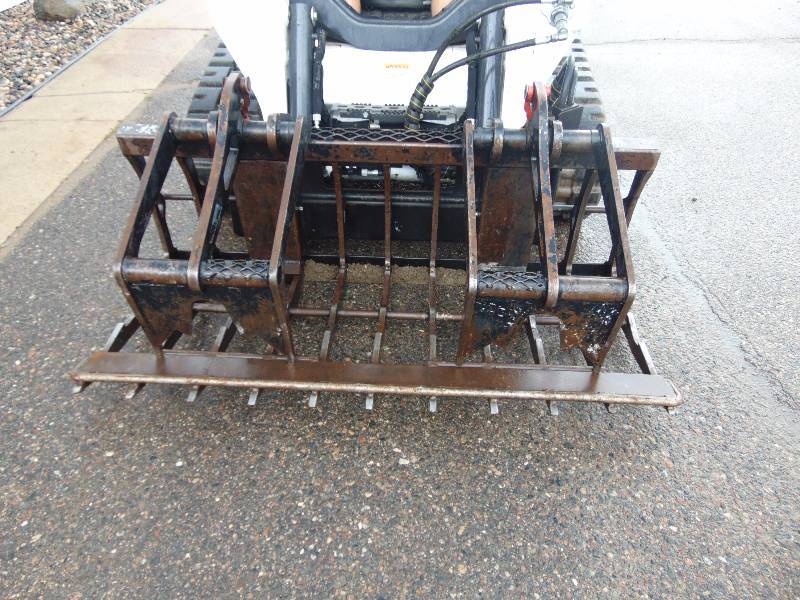 lot 124 image: Skidloader Grapple Forks
