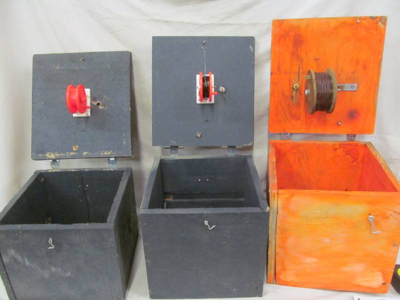 lot 190 image: ice fishing rattle reel boxes