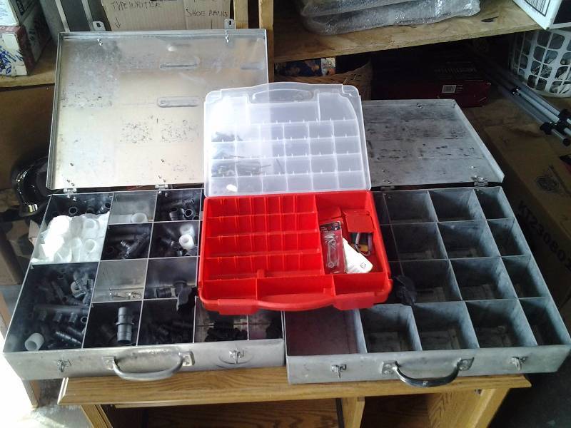 lot 22 image: 2-Metal Parts Boxes (1-Full Of Pex Connectors), 1-Plano Organizer