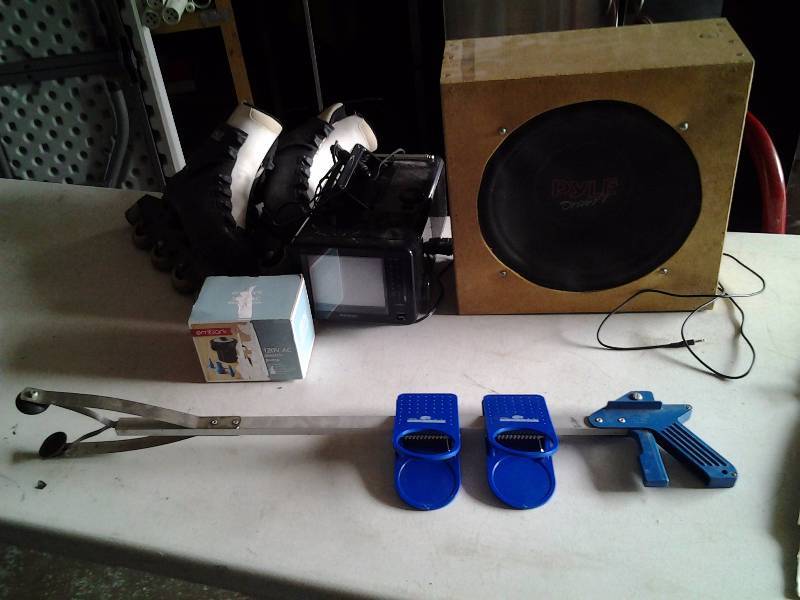 lot 41 image: 12 Inch Sub, Pair Roller Blades, Air Pump, Grabber Tool
